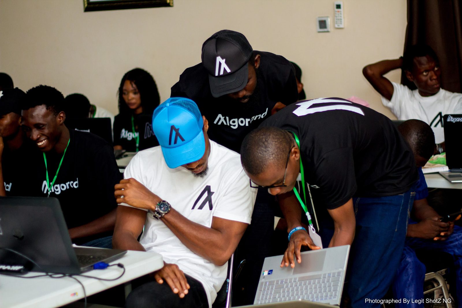 Two mentors reviewing a learner's work